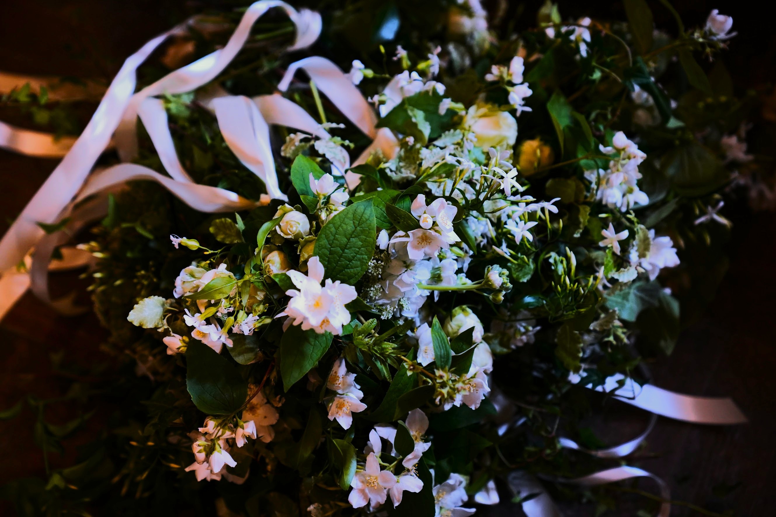 White bouquet with satin ribbon